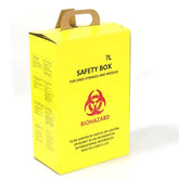 A bright yellow biohazard safety box with a brown cardboard handle, printed with black text and a red biohazard symbol, photographed on a white background.